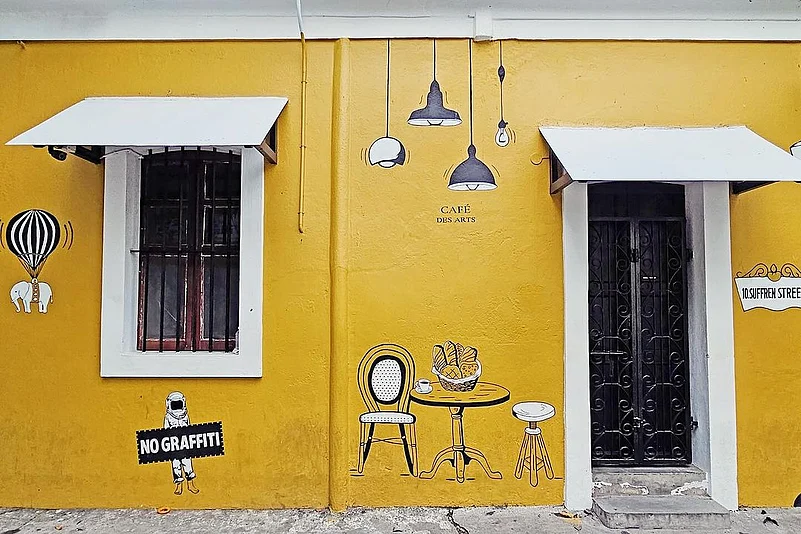 The cheerful yellow facade draws you in